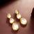Triple teardrop kundan earrings