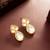 White teardrop statement earrings
