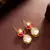 pink white pear drop earrings