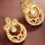 Red chandbali style earrings