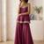 Plum palazzo set with mirror-work detailing.