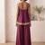 Plum palazzo set with mirror-work detailing.