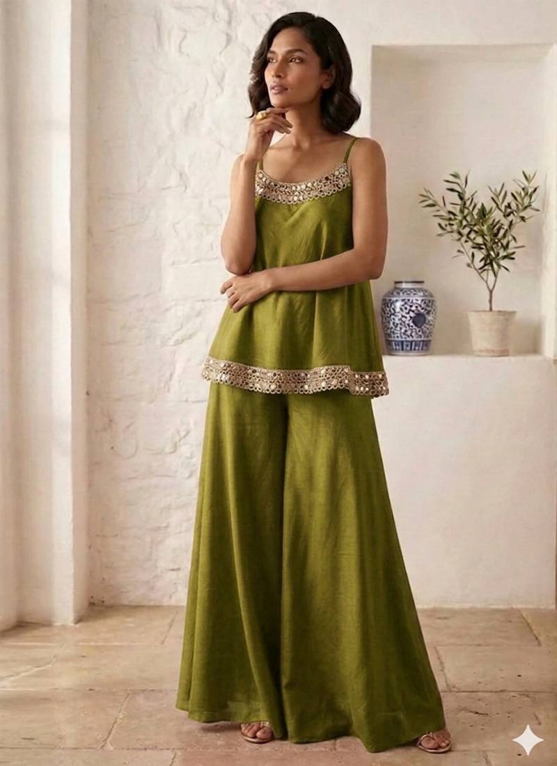 Lime green palazzo set with mirror-work detailing.