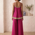 hot pink palazzo set with mirror-work detailing.