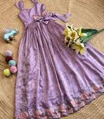 New trendy girls elegant white crinkled ethnic gown with pink lotus border and stylish waist bow