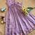 New trendy girls elegant white crinkled ethnic gown with pink lotus border and stylish waist bow