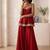 Red palazzo set with mirror-work detailing.