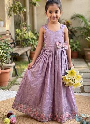 New trendy girls elegant white crinkled ethnic gown with pink lotus border and stylish waist bow 2