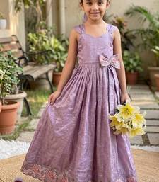 New trendy girls elegant white crinkled ethnic gown with pink lotus border and stylish waist bow
