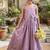 New trendy girls elegant white crinkled ethnic gown with pink lotus border and stylish waist bow