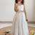 New latest girls sage green crinkled silk festive gown with handcrafted bow and lotus cutwork border