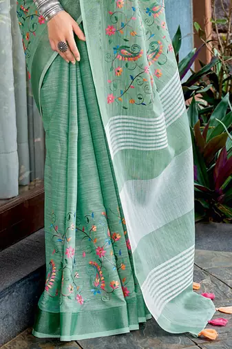 sea green linen saree with floral work