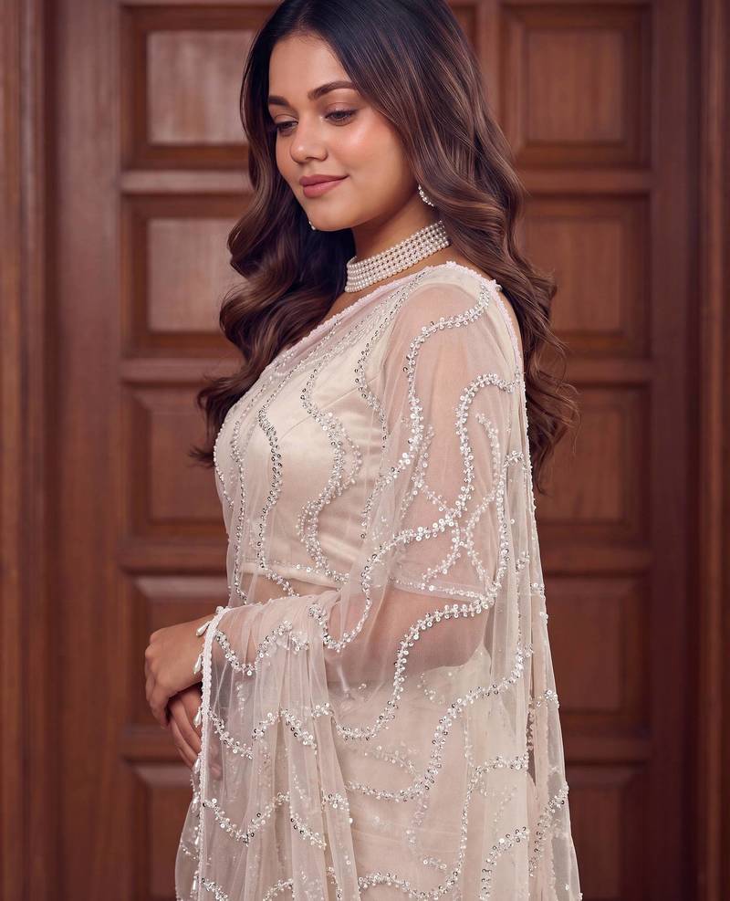 white embroidered net saree