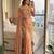 peach embroidered satin saree