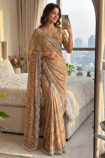 cream embroidered satin saree