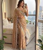 cream embroidered satin saree