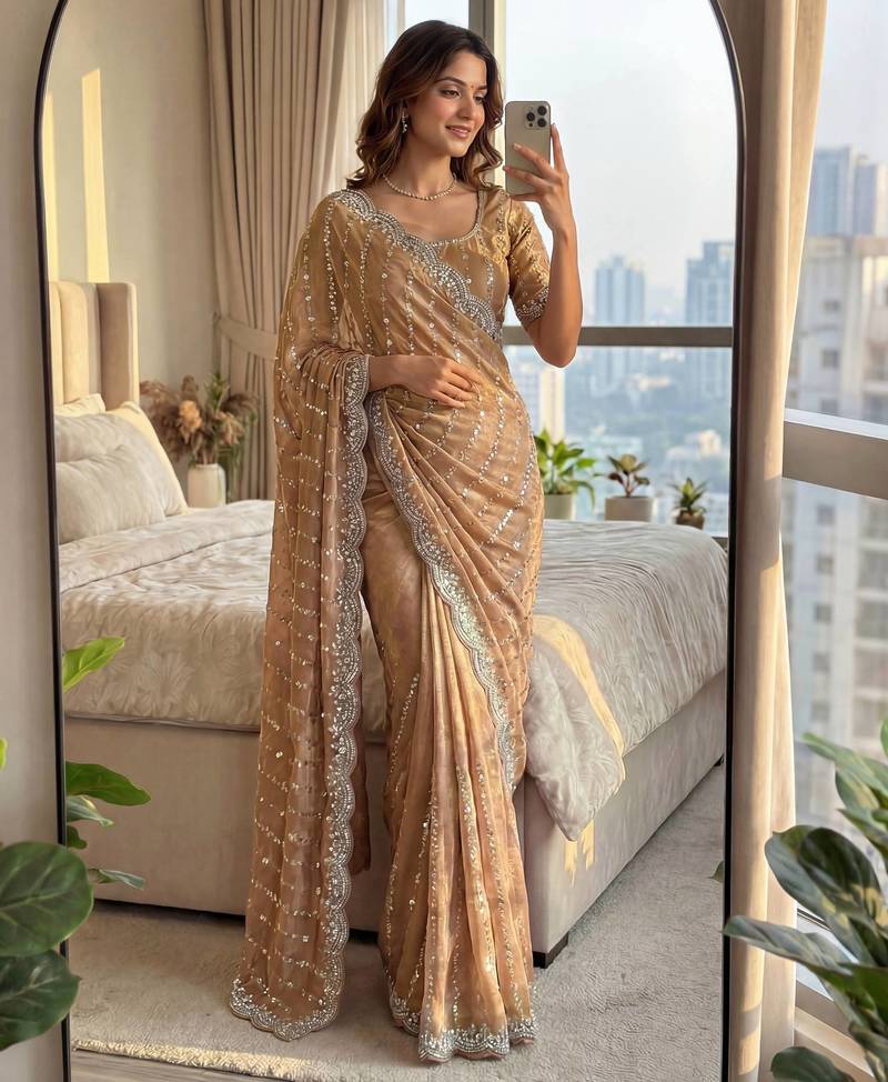 cream embroidered satin saree