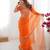orange embroidered organza saree