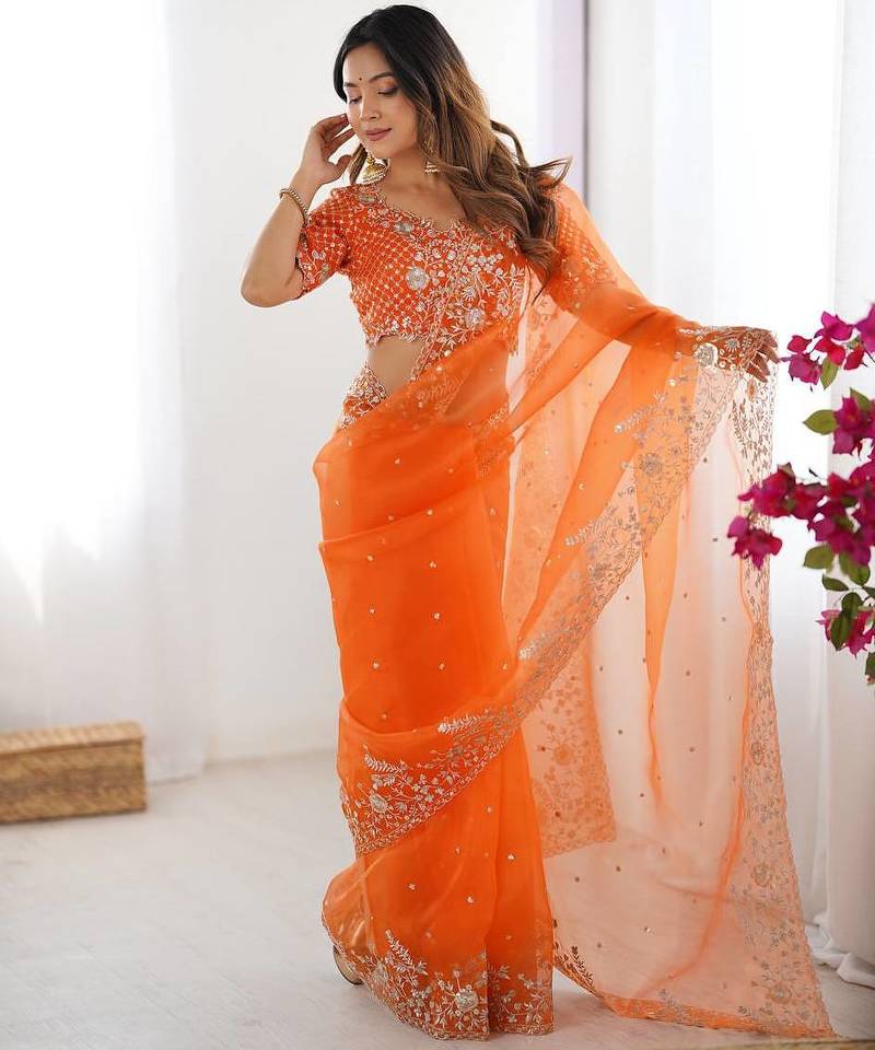 orange embroidered organza saree