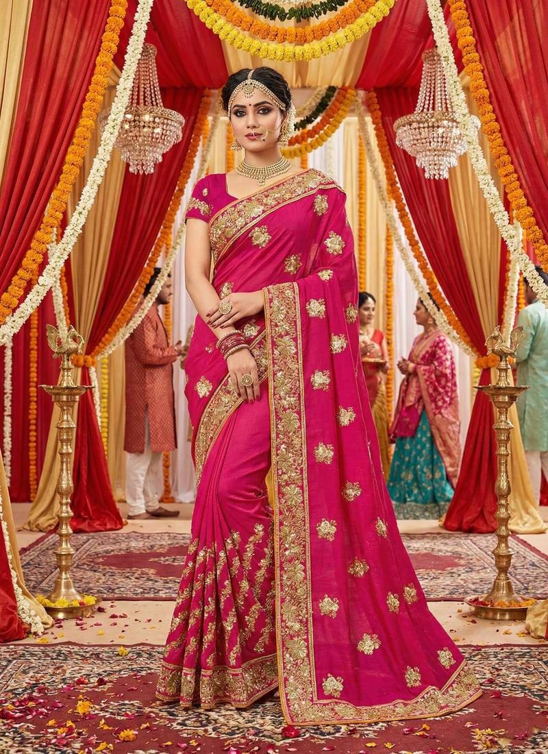 Slub chiffon wedding wear saree in rani pink with embroidery work & crystal stone work