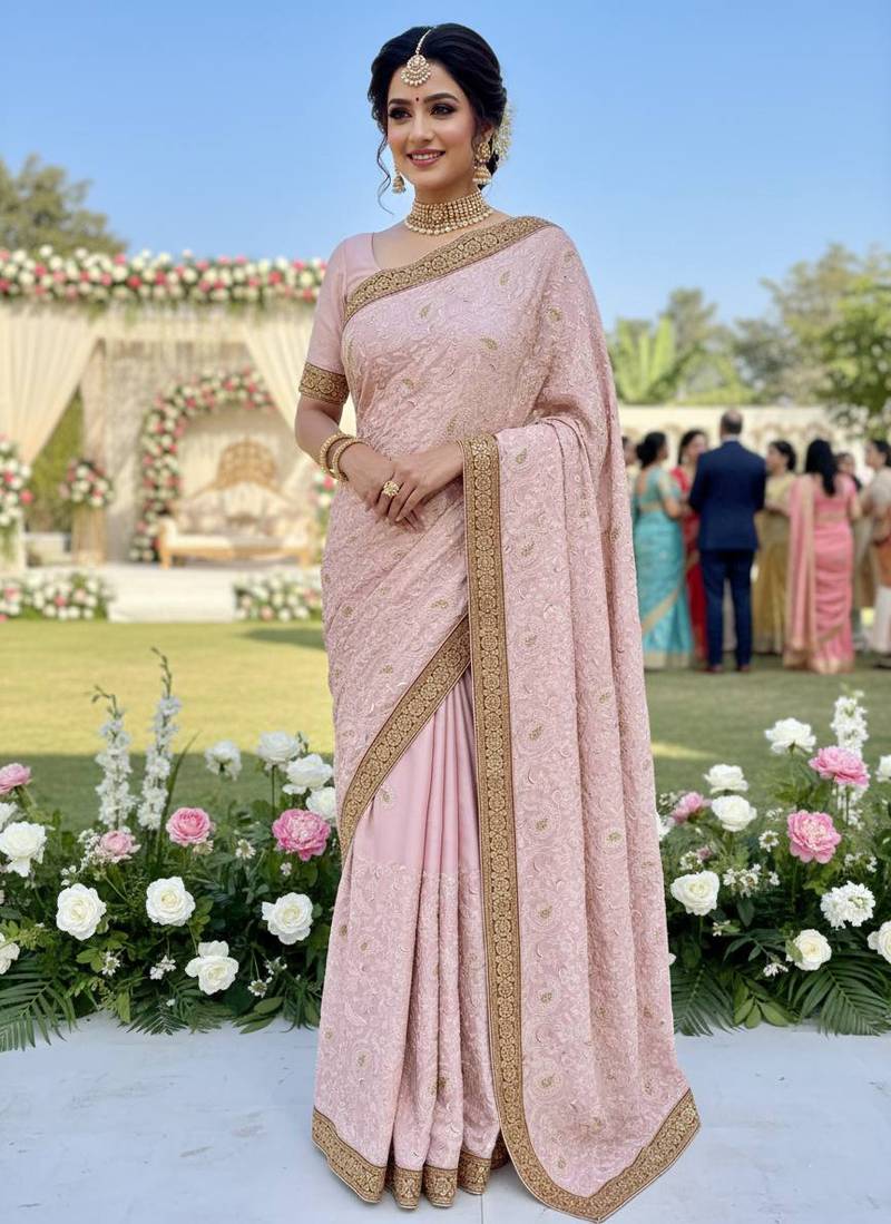 Metallic silk party wear saree in pink with embroidery work & crystal stone work