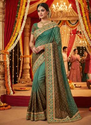 Pure sateen silk bridal wear saree in green with embroidery work & crystal stone work 1
