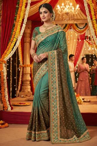Pure sateen silk bridal wear saree in green with embroidery work & crystal stone work