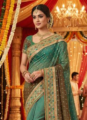 Pure sateen silk bridal wear saree in green with embroidery work & crystal stone work 2