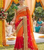 Pure georgette wedding wear saree in red & orange with embroidery work & crystal stone work