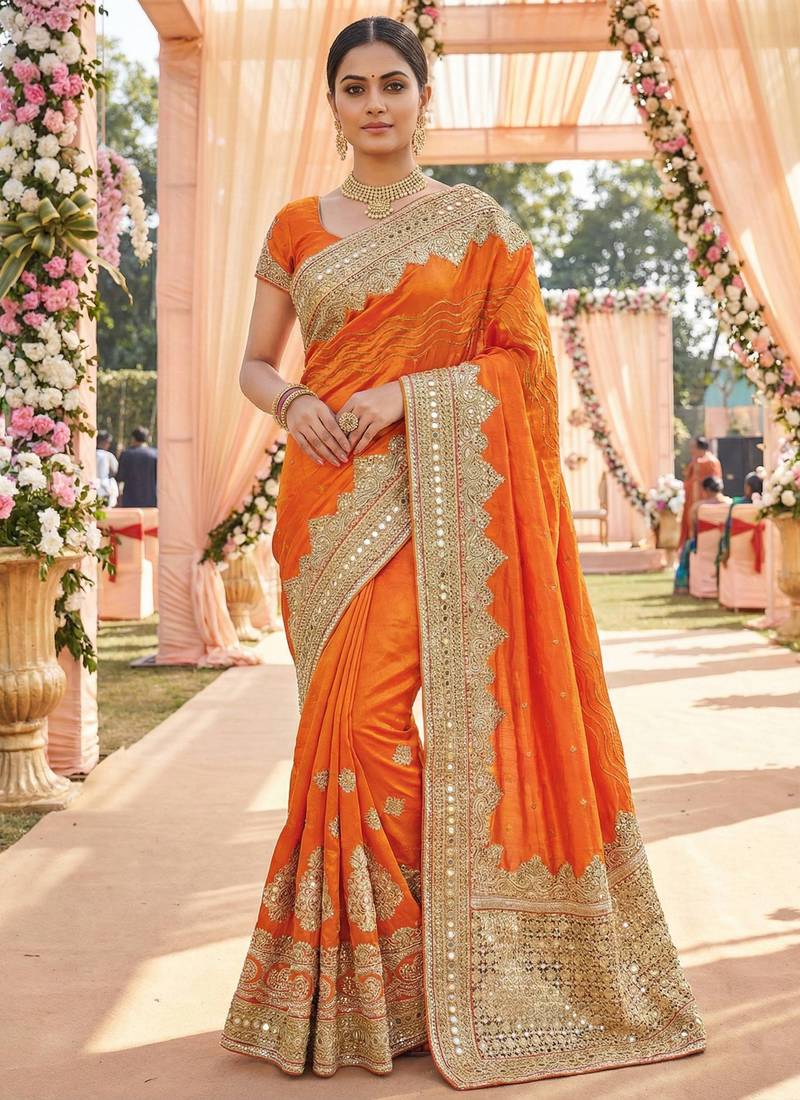 Model silk wedding wear saree in orange with embroidery work & crystal stone work
