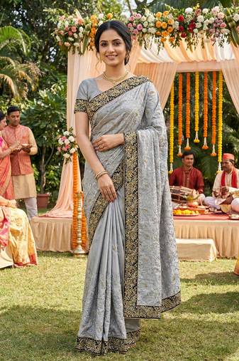 Metallic silk party wear saree in grey with embroidery work & crystal stone work