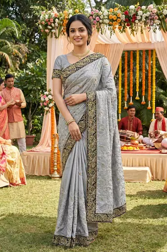 Metallic silk party wear saree in grey with embroidery work & crystal stone work