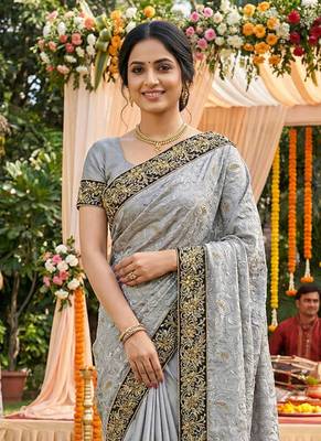 Metallic silk party wear saree in grey with embroidery work & crystal stone work 2