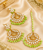 Classic kundan earrings and maang tikka