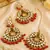 Intricate kundan earrings for festive wear