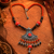 Ethnic treasure multi-bead necklace with german silver pendant