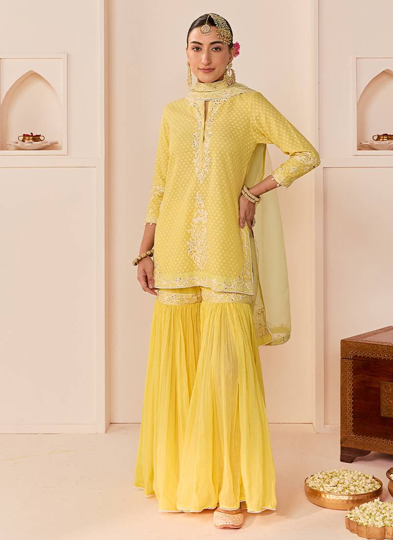 Lemon yellow embroidered chanderi silk short kurti gharara set