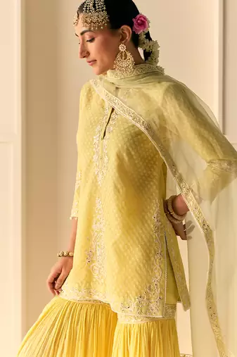 Lemon yellow embroidered chanderi silk short kurti gharara set