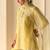 Lemon yellow embroidered chanderi silk short kurti gharara set