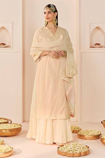Carnation pink embroidered chanderi silk kurti set with skirt