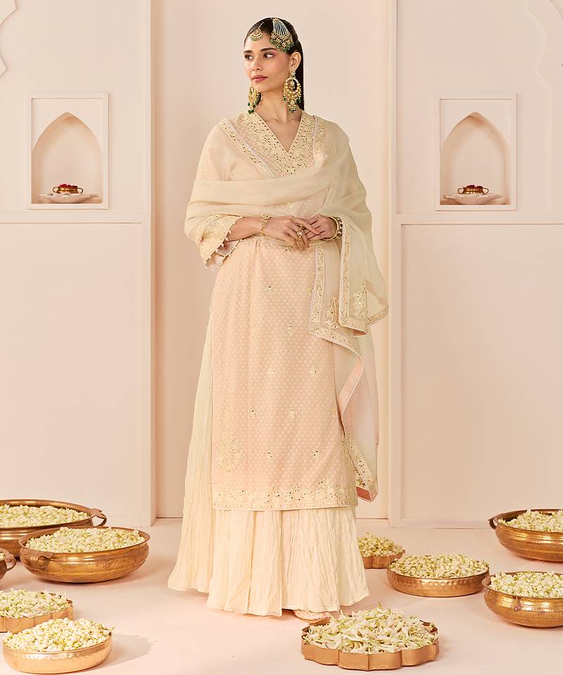 Carnation pink embroidered chanderi silk kurti set with skirt