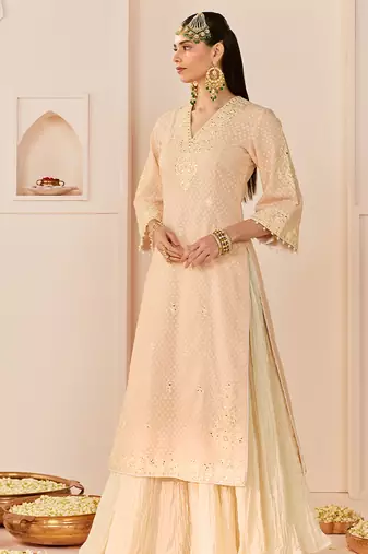 Carnation pink embroidered chanderi silk kurti set with skirt