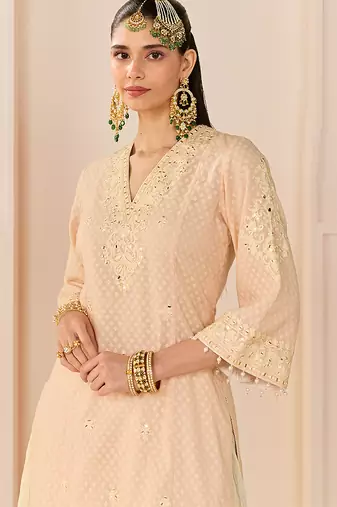 Carnation pink embroidered chanderi silk kurti set with skirt