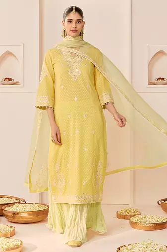 Lemon yellow embroidered chanderi silk kurti set with skirt