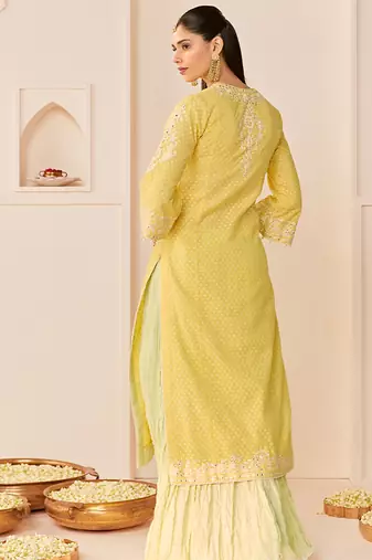 Lemon yellow embroidered chanderi silk kurti set with skirt