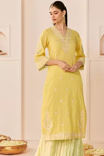 Lemon yellow embroidered chanderi silk kurti set with skirt