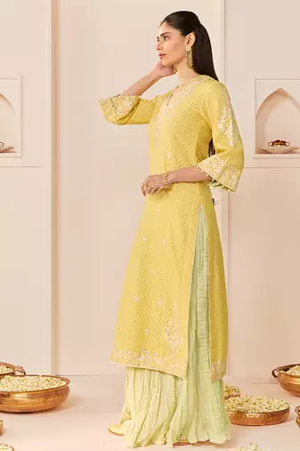 Lemon yellow embroidered chanderi silk kurti set with skirt