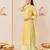 Lemon yellow embroidered chanderi silk kurti set with skirt
