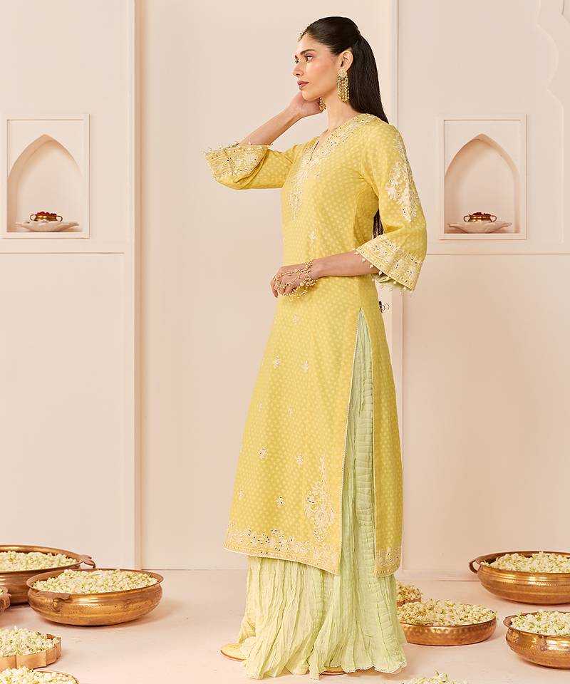 Lemon yellow embroidered chanderi silk kurti set with skirt