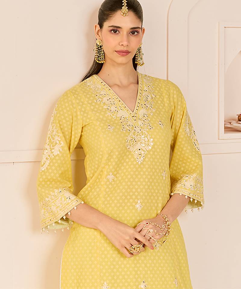 Lemon yellow embroidered chanderi silk kurti set with skirt